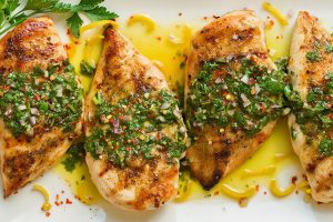 Boneless chicken leg grilled and argentine “chimichurri” sauce